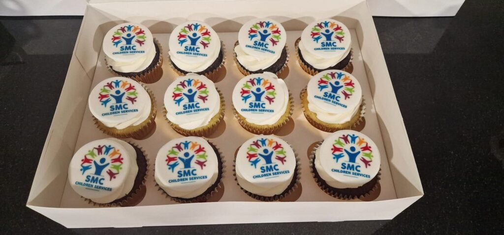 Cupcakes decorated with the SMC logo